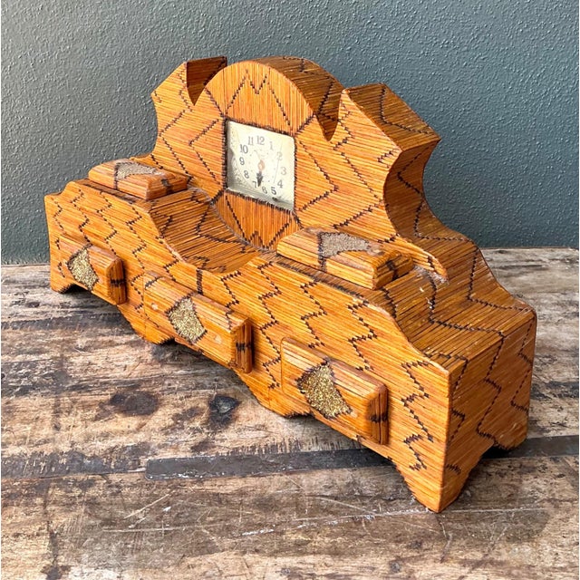This remarkable vintage handcrafted mantel clock showcases the ingenuity and patience of traditional folk art...