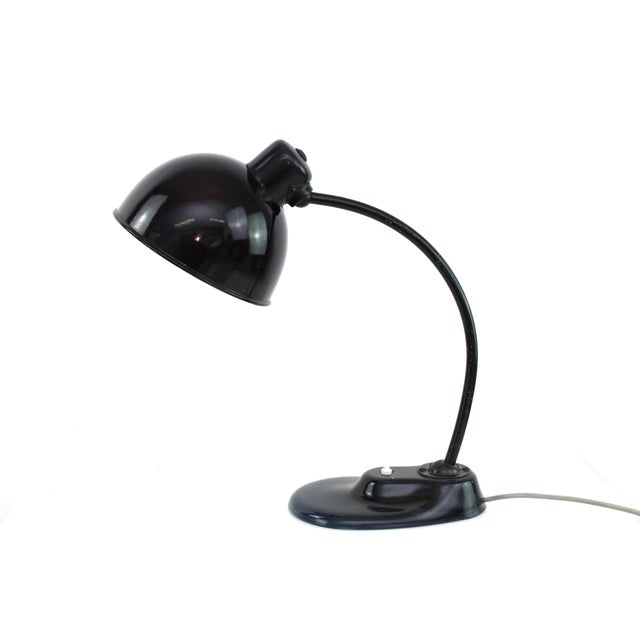 Kandem brand in the dome, glass base lacquered inside, minimal chip (see photo) This piece has an attribution mark, I am...