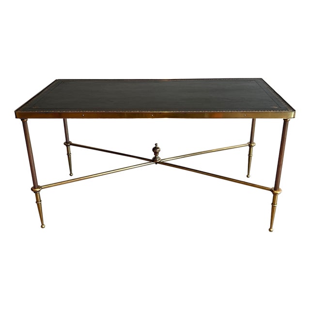 1940s Neoclassical style brass coffee table with black leather top Attributed to Maison Jansen For Sale