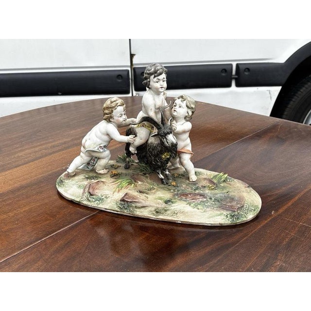 Porcelain Group of Nude Putti & the Goat Amalthea on Wooden Display Stand For Sale - Image 13 of 16