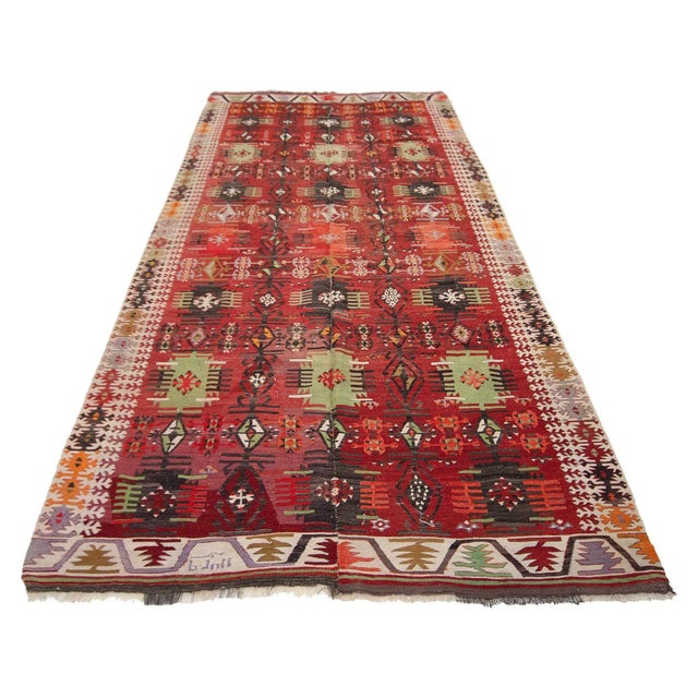 Handwoven vintage kilim rug from Kayseri region of Turkey. Approximately 60-70 years old. In very good condition.
