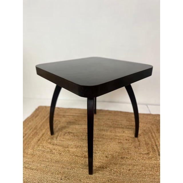 A beautifully sculptural “spider” coffee table designed by jindřich halabala for up závody, czechoslovakia, circa 1930s....