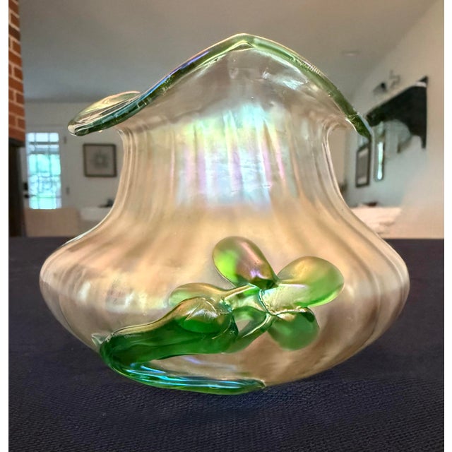 There are objects that hold light differently than everything around them — and this Kralik vase is one of them. Produced...