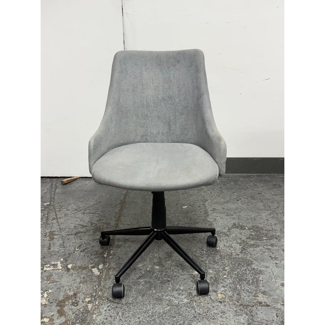 Design Plus Gallery presents an Adjustable Swivel Desk Chair from Pottery Barn. This upholstered desk chair has a softly...
