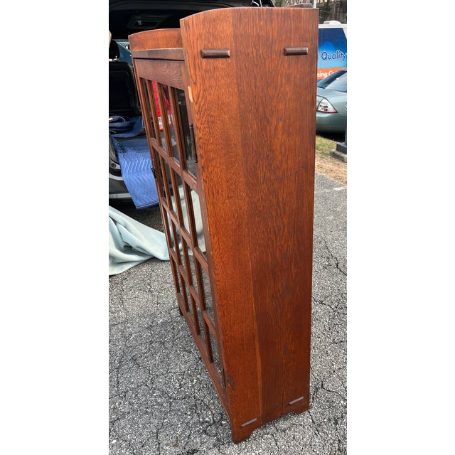 Fine antique single door bookcase oak bookcase by Gustav Stickley. Model 715 with hammered handle and lock with working...