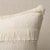 This pillow features Acadia with a knife edge finish. A horizontal fringed stripe, this pattern derives from a textile in...