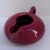 Mid-century high gloss glaze burgundy ceramic squat pitcher with a ring handle, suitable as a sauce boat or batter bowl....