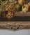 Well executed early 20th century still life oil on canvas. Showing a display of arrange of exotic fruits with a bouquet of...