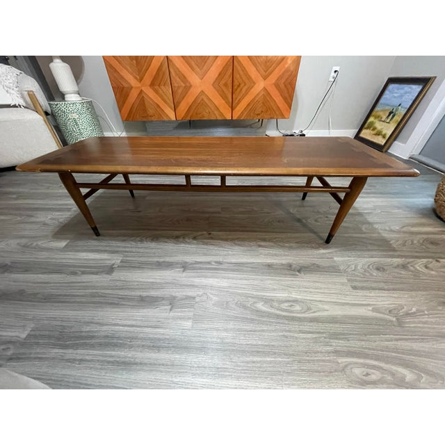 Authentic Mid-Century Modern coffee table by Lane Furniture, showcasing the clean lines, quality craftsmanship, and...