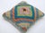 A one-of-a-kind handwoven Afghan wool kilim accent pillow featuring concentric diamond medallion. Cut and sewn by hand...