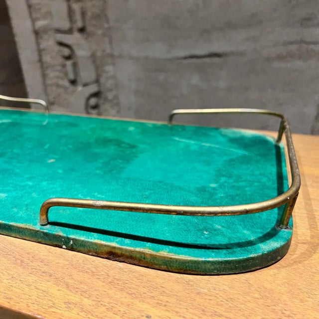 For your consideration, a 1950s Aldo Tura green serving Tray made from lacquered goatskin and brass galleries. Designed by...