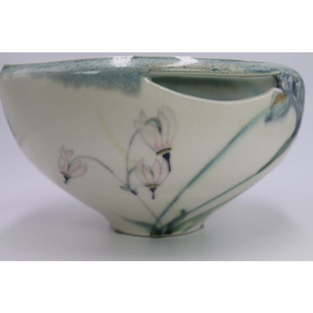 Beautiful work and details for this hand cutout ceramic piece by Robert Finn Pottery. Hand painted Columbines and a...