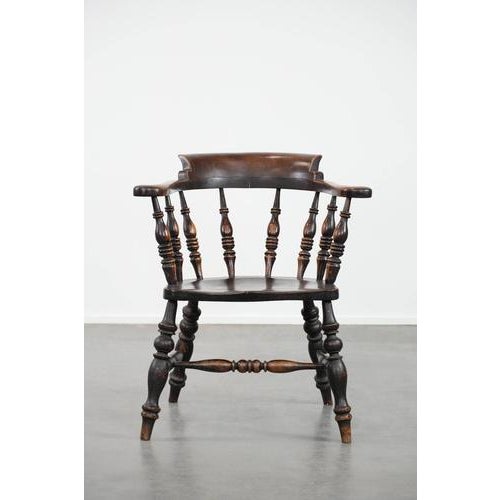 This beautiful antique English captain's chair has acquired a wonderful patina over the years. This chair dates from the...