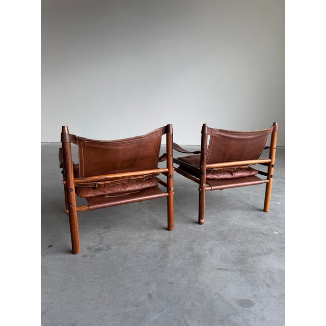 Mid-Century Modern Mid Century Arne Norell Sirocco Rosewood and Brown Leather Safari Chair Pair For Sale - Image 3 of 12