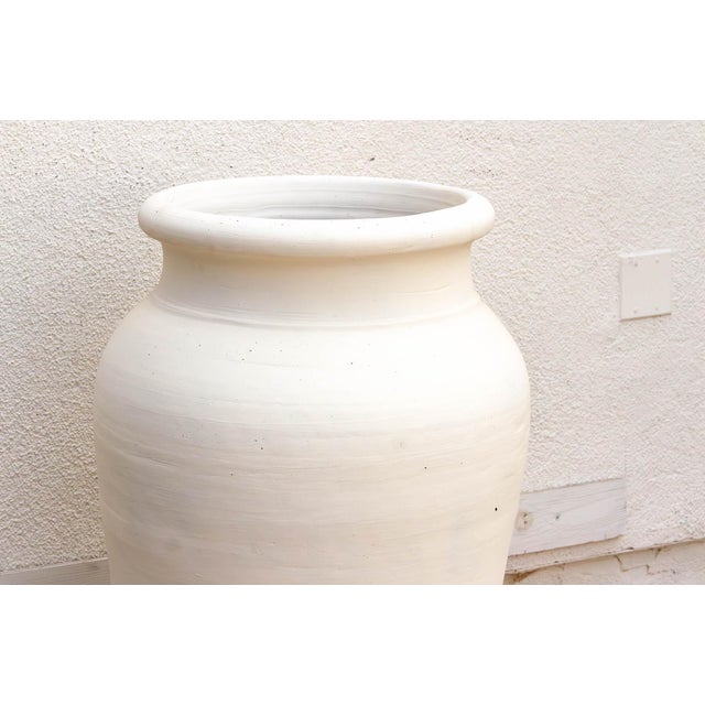 A sculptural masterpiece with a towering silhouette, This Aegean planter is a grand interpretation of ancient...