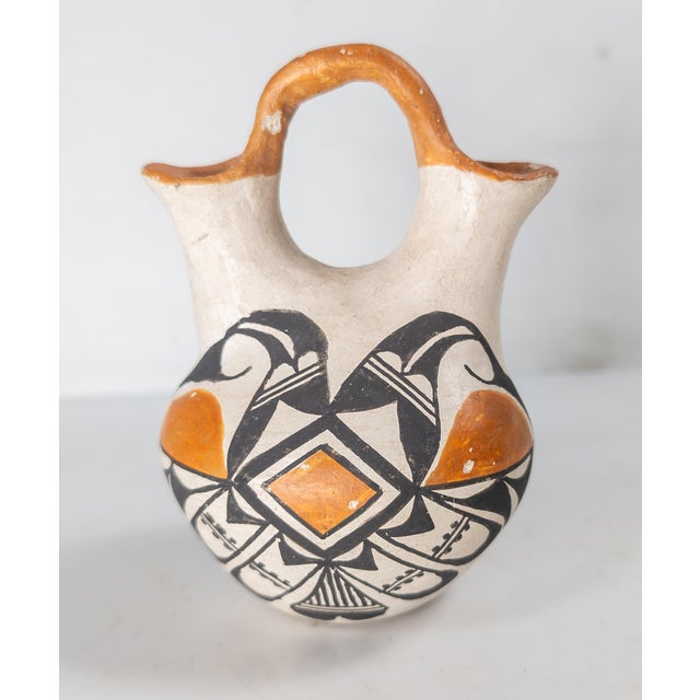 We are selling this nice Mid-Century Native American Indian Acoma pot. This pot is simply decorated and probably intended...
