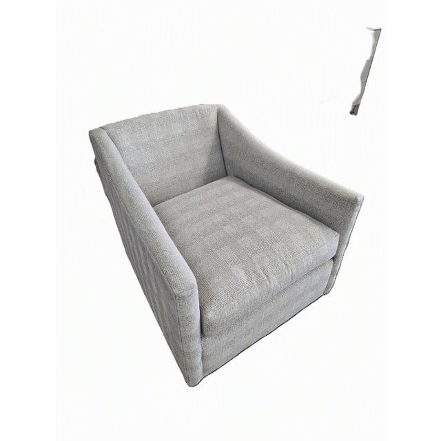 Modern swivel chair by Arhaus. Comfortable and durable fabric.
