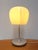 The IKEA Althorn table lamp is a timeless Scandinavian design featuring a softly illuminated frosted glass shade and a...