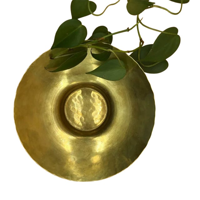 Handcrafted by Fairthorne Studios of Canada, this elegant 7-inch hand-hammered brass bowl is a beautiful example of...