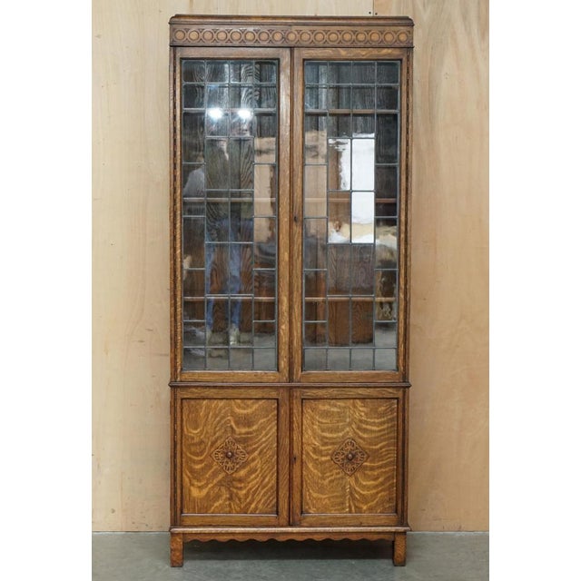 Stunning English Circa 1900 English Oak Lead Lined Astral Glazed Bookcase or Display cabinet stamped Roberts This item is...