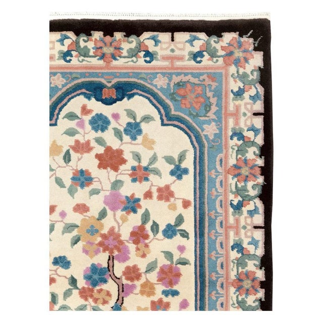 A vintage Chinese Art Deco throw rug handmade during the mid-20th century. Measures: 3' 1" x 4' 11".