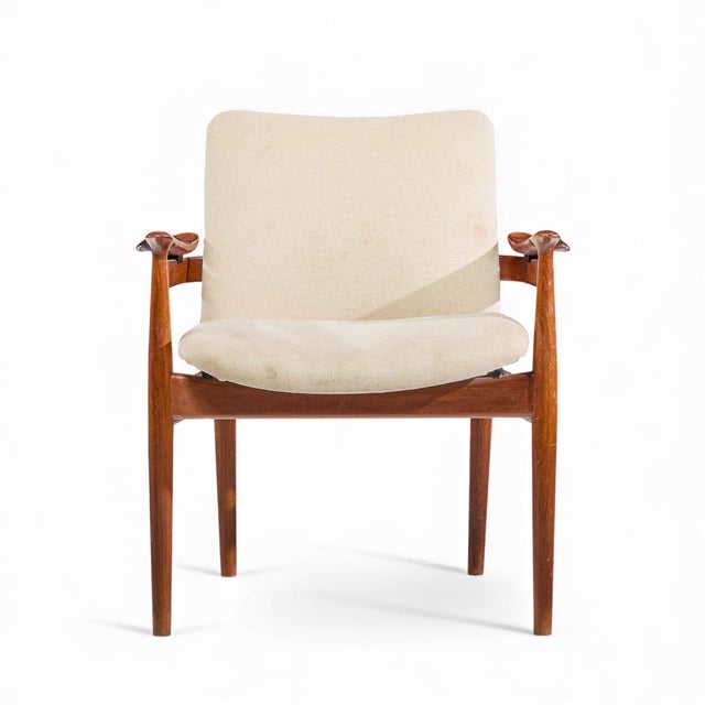 Finn Juhl Model 192 Mid Century Danish Teak Occasional Chair This chair measures: 28.25 wide x 26 deep x 32.5 high, with a...