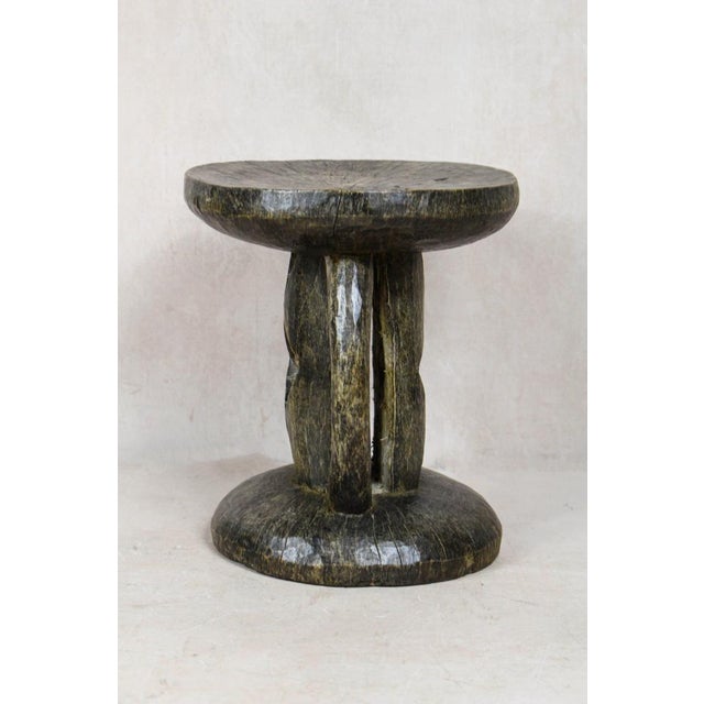 Hand-carved from a single piece of wood, the Tonga stool is a genuine artifact. These stools were status symbols for...
