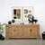 Handcrafted from unsealed solid wood, this grand four-door tall sideboard brings warm architectural presence and...