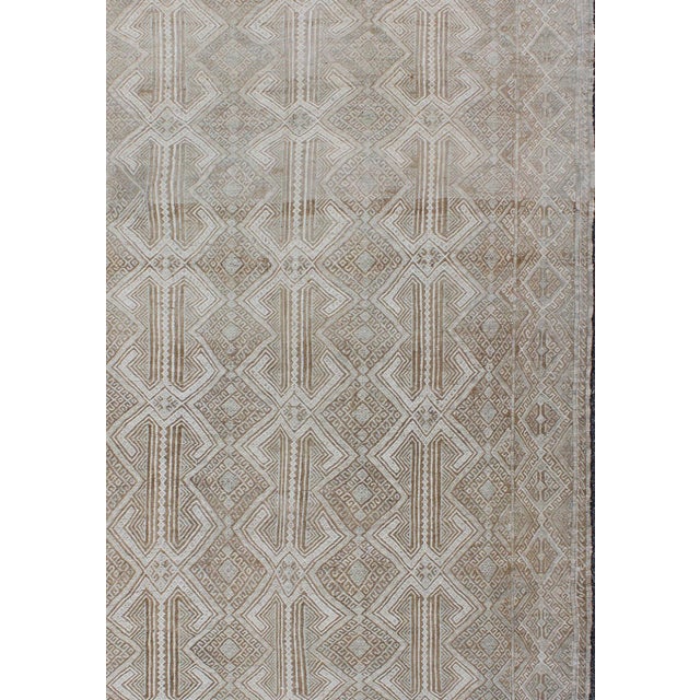 Midcentury Turkish Embroidered Flat Weave with all-over geometric design in ivory, taupe, light brown and neutral tones....