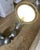 Authentic vintage Jieldé wall lamp. The lamp has been completely stripped, brushed, and finished with a graphite black...