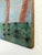 Traditional folk art mixed media painting depicting a lush landscape accented with fence made from wire and nails. Paint...