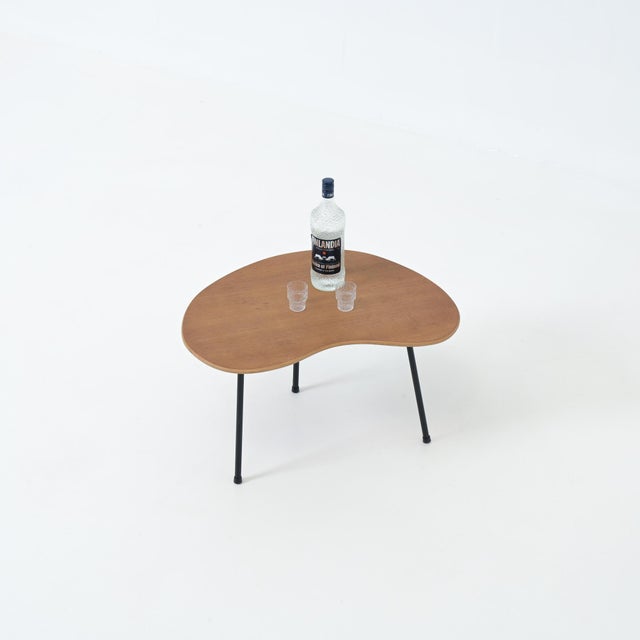 This beautiful kidney shaped side table was designed by Pierre Guariche for Trefac / Meurop Belgium in the fifties. The...