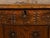 An English oak wedding coffer from the late 17th century, with carved rosettes and iron inlaid monogram. Created in...