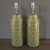 These ceramic table lamps feature a tropical banana leaf pattern in a vibrant green color, adding a touch of exotic flair...