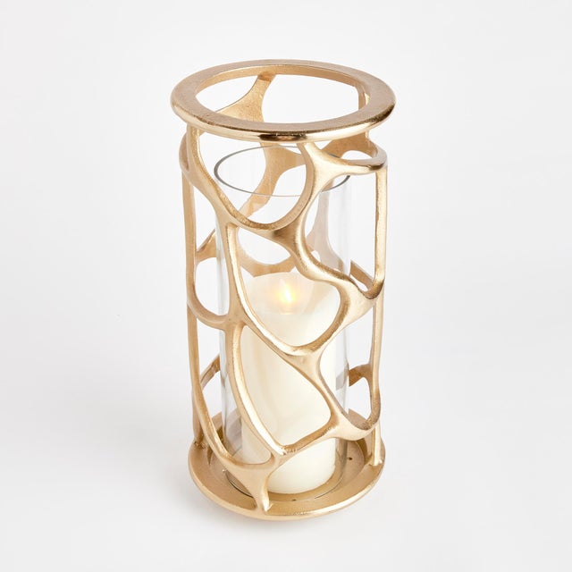 With a handsculpted meandering design, you, d never guess this artisan hurricane is made of a sturdy cast aluminum. With a...