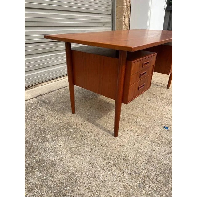 Mid Century Modern Floating Top Teak Desk with key possibly by Johannes Sorth Well made, finished on all sides , a built...