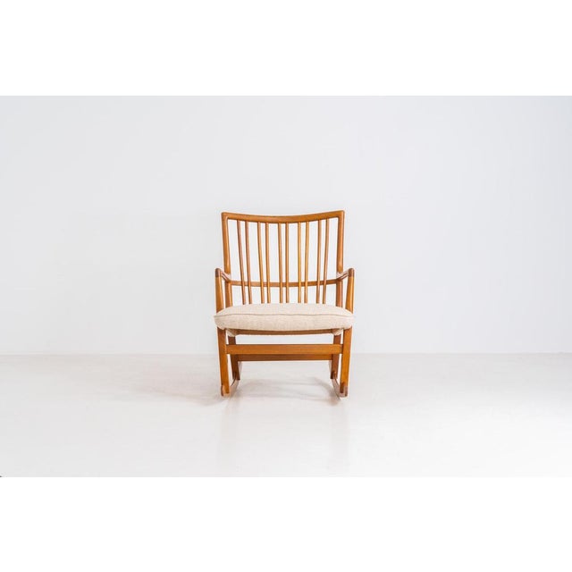 A rare “ml33” rocking chair by hans j. Wegner for a. Mikael laursen (denmark, 1950s). Pure danish craftsmanship from the...