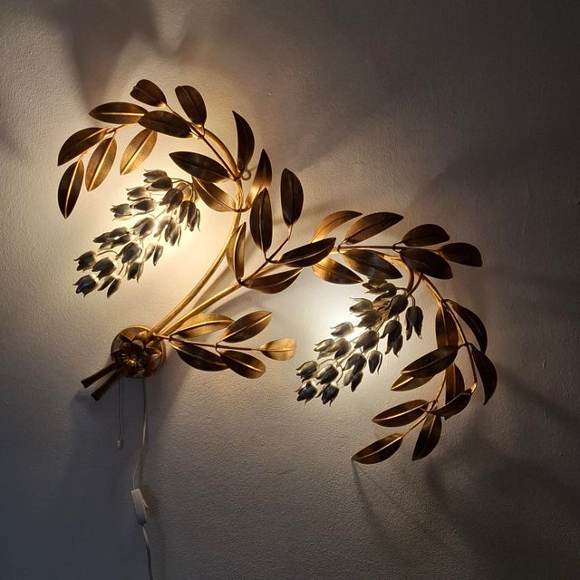 Extra-large, two-light wall lamp by hans kögl from the 1970s, made in italy. this artistic wall lamp is both functional...