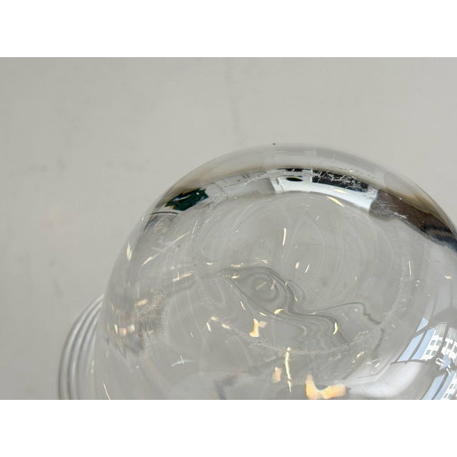 An elegant glass object from the long-established swiss glassworks glasi hergiswil, designed by roberto niederer. The...