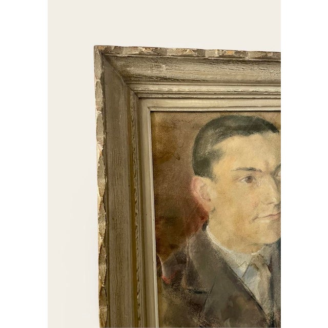 Three-quarter portrait of a man, with a deep gaze and composed expression, typical of the bourgeois aesthetic of the...