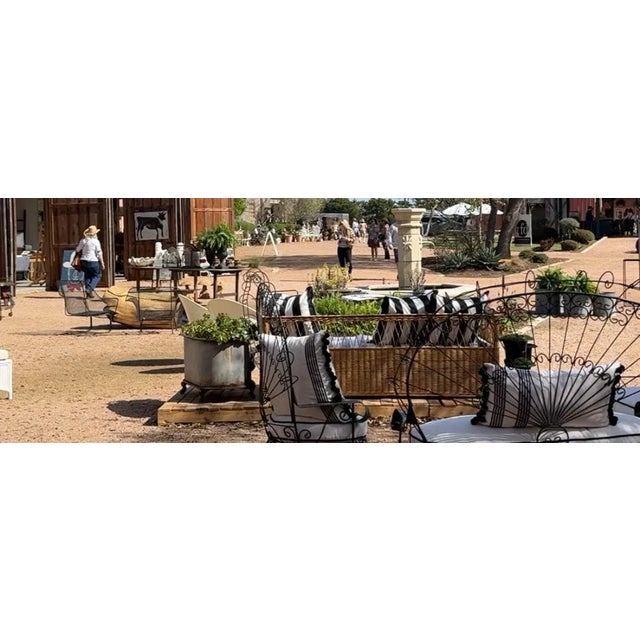 Gorgeous mid-century John Salterini attributed wrought iron fan back peacock chairs, a pair. These pieces have been...