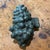 Vintage grape pewter mold, likely used for making ice cream or chocolate or candy in the shape of a bunch of grapes. It...