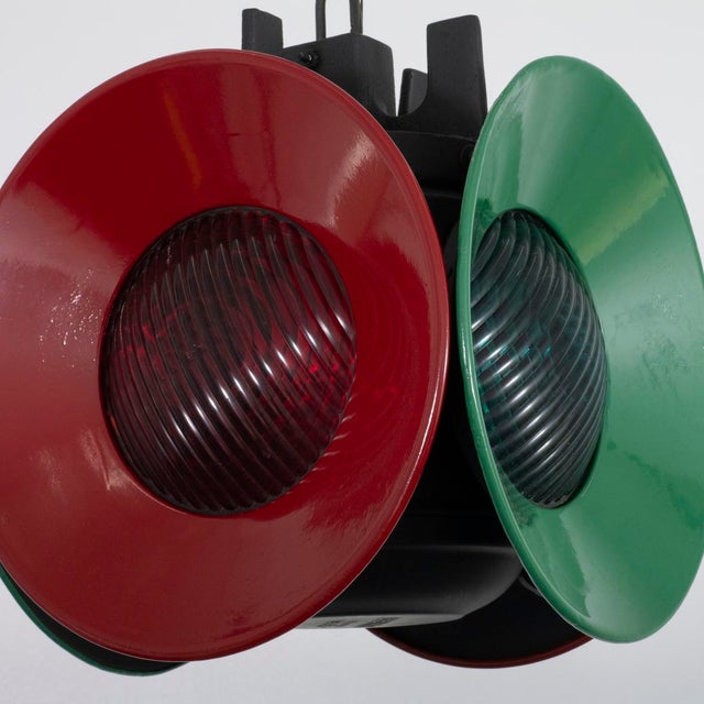 Vintage Adlake railroad switch light retrofit by Spark Interior into a ceiling pendant. UL certified.