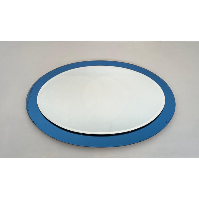 Oval shaped mirror with a bluish outline by Crystal Art Torino. Circa 1960 For Sale - Image 6 of 12