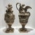 Pair of antique (19th century) French silvered bronze ewers in the French Louis XVI style, after the original designs by...