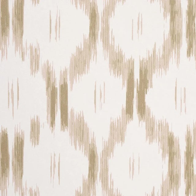 This artisanally crafted wallpaper by Mark D. Sikes puts a fresh spin on an archival ikat. Keep the borders intact or cut...