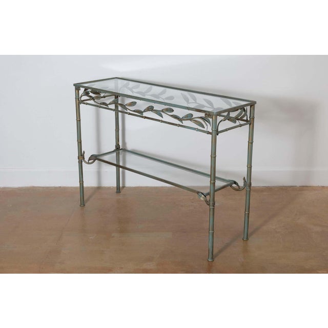 This 20th-century French console table embodies a light and airy aesthetic, blending functionality with artistic...