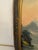 This striking vintage vertical landscape painting captures an atmospheric wilderness scene featuring misty, jagged...