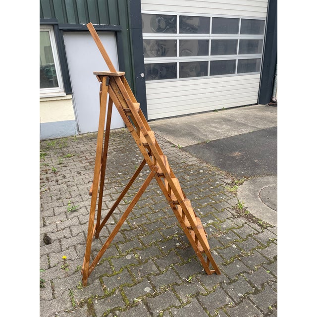 Beautiful folding library ladder. France, 1950s. Solid, well-crafted quality. The solid oak has been professionally...