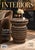 This is a cylindrical accent table featuring an intricate open-lattice design with a heavily textured, metallic-finished...